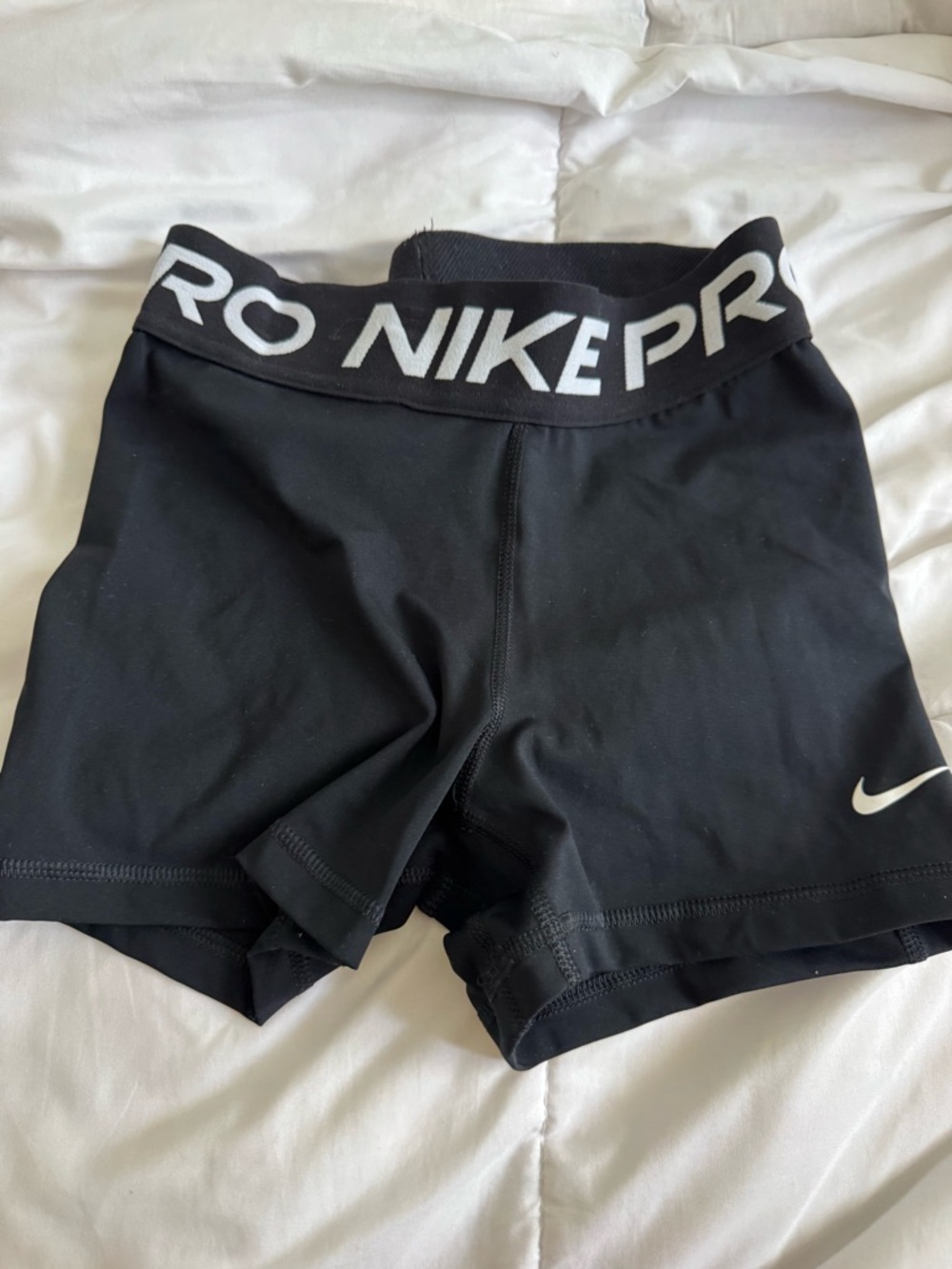 Nike Black Athletic Compression Shorts with White Tag Detail